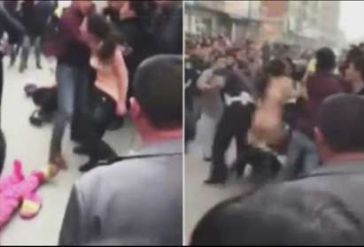 Пияна китайка се съблече гола след бой с полицаи, арестуваха я