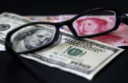 Китайските валутни резерви намаляха със 100 милиарда долара за месец