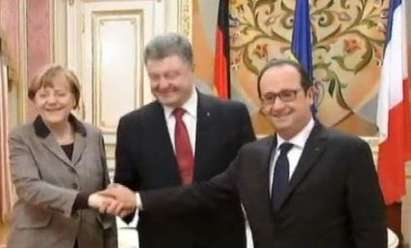 Меркел и Оланд преговарят с Порошенко и Путин за мир в Украйна