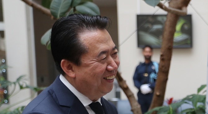 Интерпол поиска информация от Китай за шефа си