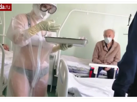Куриоз: 20-годишна медсестра направи стрийптийз в защитен костюм