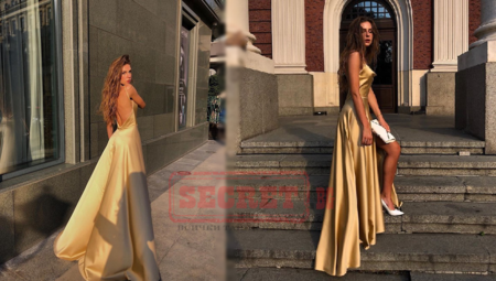 Дъщерята на президента със златна рокля на бала си