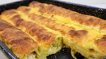 Най-вкусната баница с готови кори е по тази рецепта! Залейте я с това и ще се надуе до небето